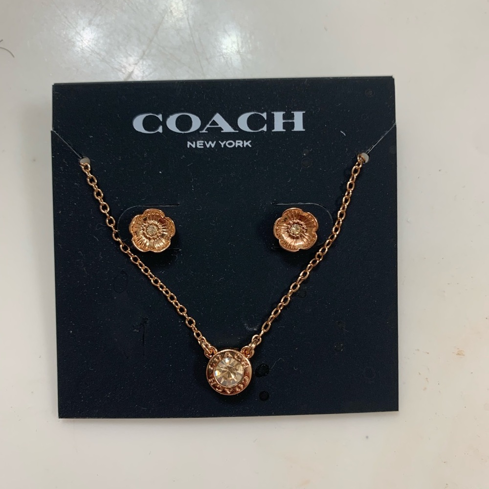 Coach Signature Stone Tea Rose 3 piece jewelry set.